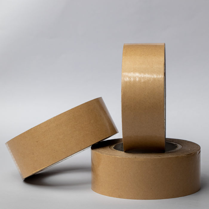 Three rolls of eco-friendly brown packing tape, 2 inches wide, showcasing their height and sustainable packaging